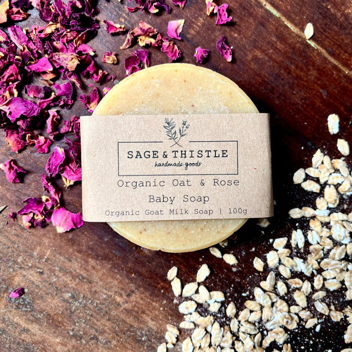 puck of soap with rose petals and oats