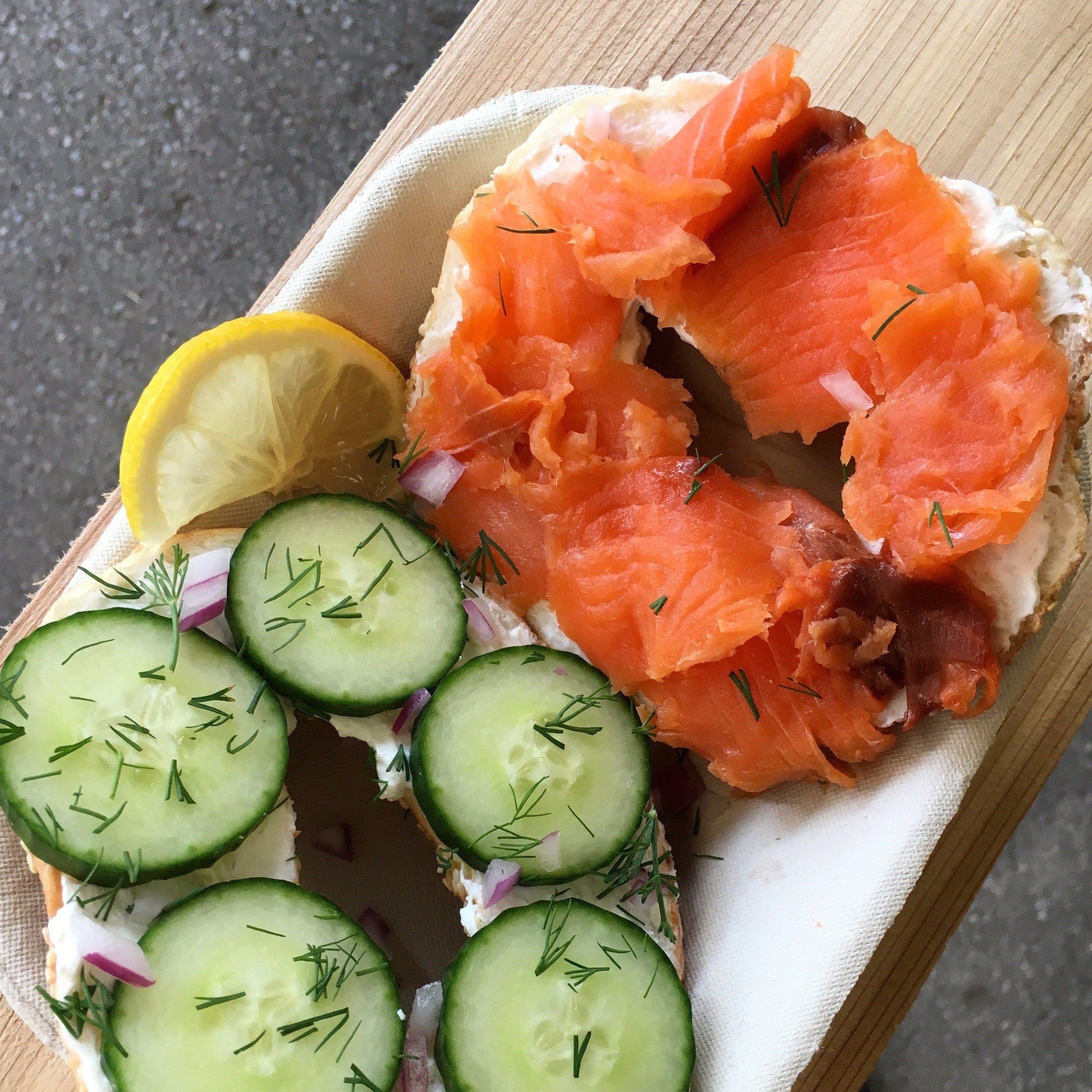 Cold Smoked Char plated on bagel.