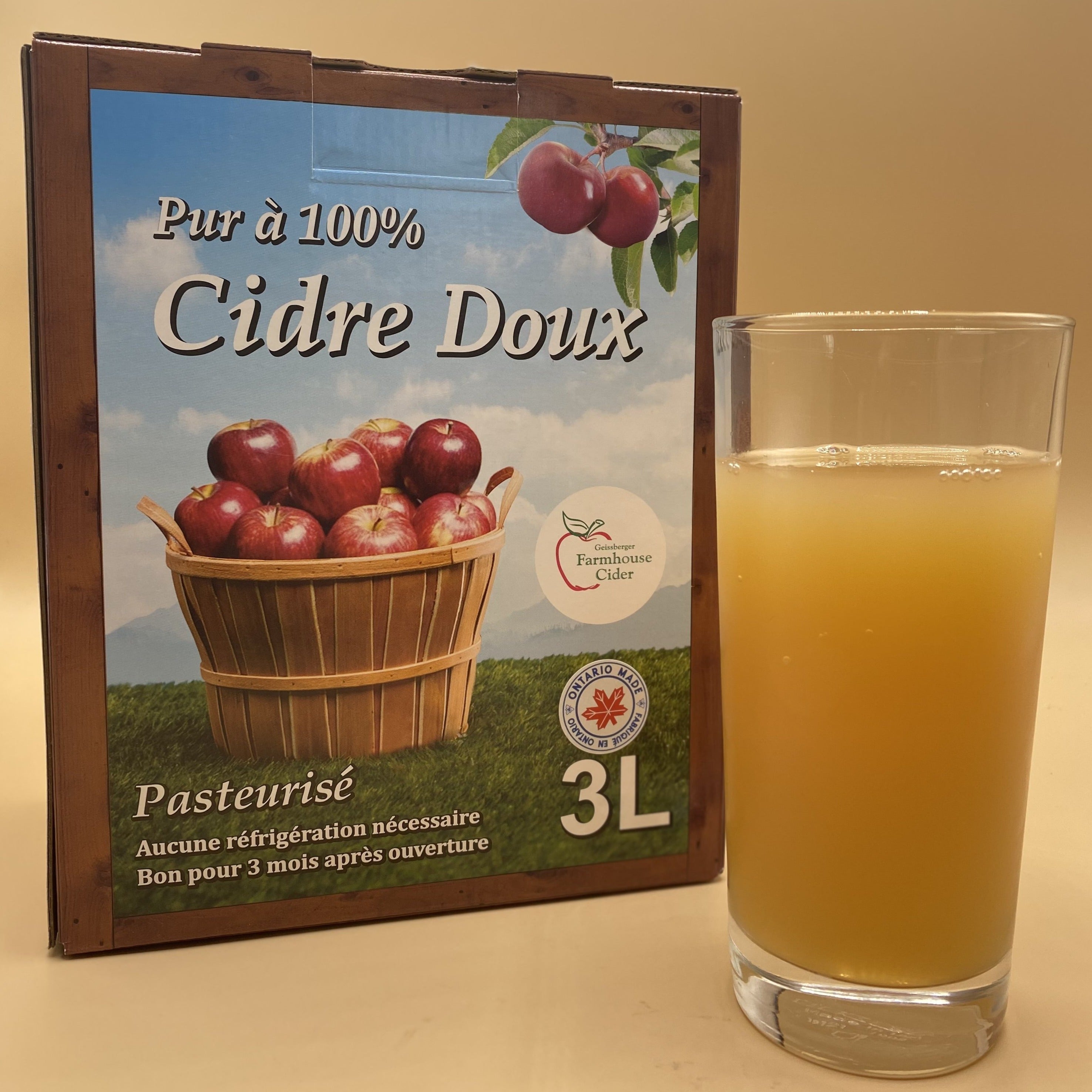 Glass and box of apple cider