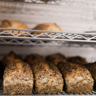 loaves of bread on a shelf