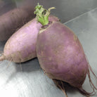 Two Purple Daikon Radishes.